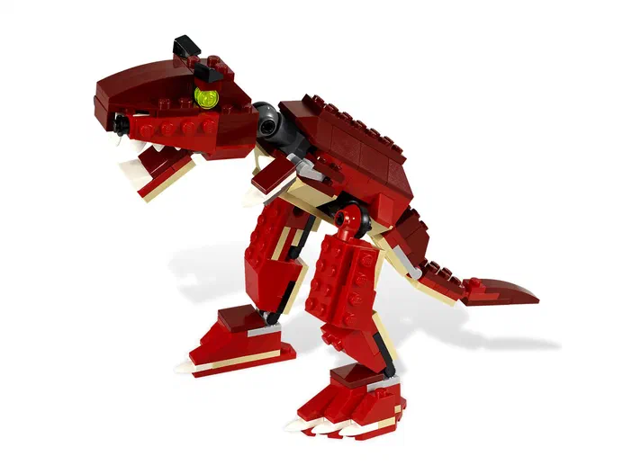 Un modèle de dinosaure rouge construit avec des briques Lego Creator 3-in-1 n°6914 Prehistoric Hunters.