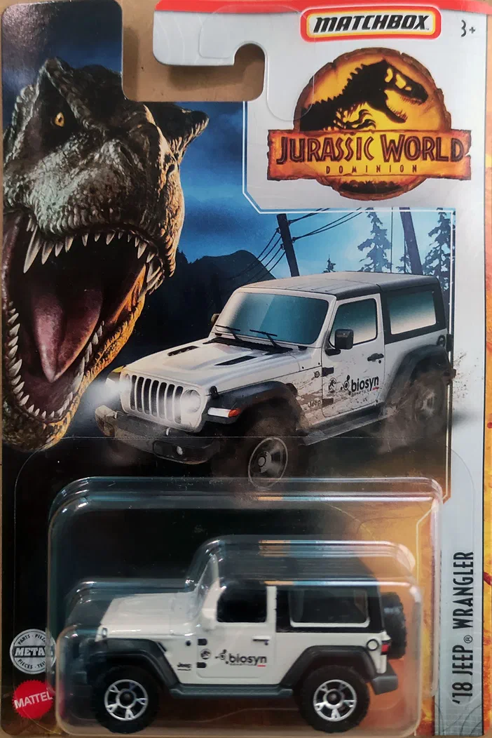 Jouet Matchbox d'un véhicule blanc de type '18 Jeep Wrangler lié au film Jurassic World Dominion et illustré par un dinosaure en arrière-plan.