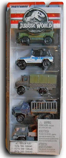 All-Terrain Fleet - FMY25 Emballage de jouets Matchbox Jurassic World contenant cinq véhicules tout-terrain visibles à travers le plastique transparent avec logos et avertissements.