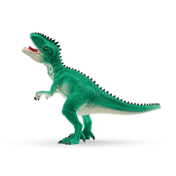 Jouet de dinosaure vert debout sur deux pattes avec la bouche ouverte et des épines dorsales noires.