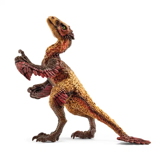 Figurine de dinosaure à plumes représentant un Dakotaraptor sur fond blanc.