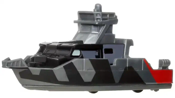 Un véhicule de patrouille Matchbox gris et noir avec des motifs géométriques sur le flanc.