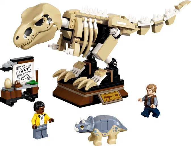 Ensemble de construction LEGO Jurassic World 76940 présentant le squelette du Tyrannosaure Rex, un Tricératops et deux personnages minifigures.