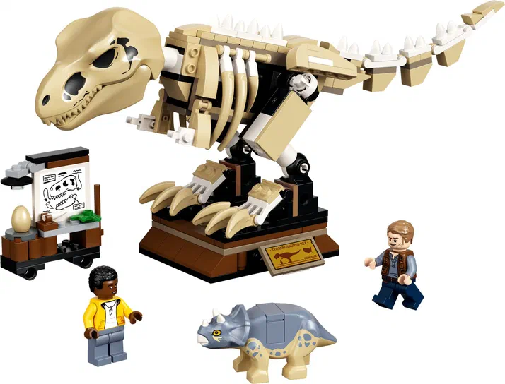 Ensemble de construction LEGO Jurassic World 76940 présentant le squelette du Tyrannosaure Rex, un Tricératops et deux personnages minifigures.