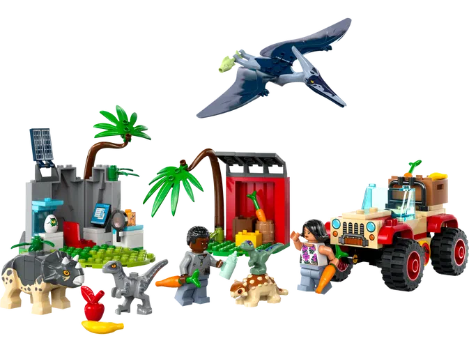 Ensemble de figurines LEGO Jurassic World avec des dinosaures, un pterodactyle et une jeep.