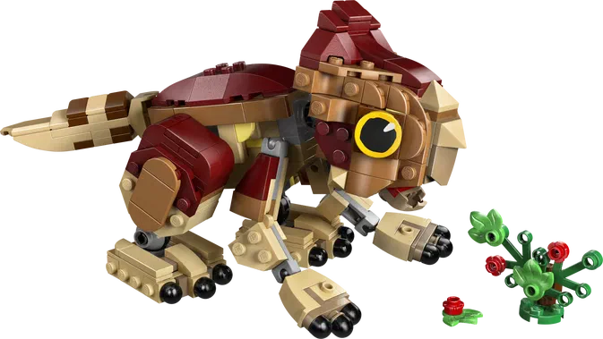 Un dinosaure mécanique LEGO de couleur marron et rouge avec des fleurs vertes à côté.