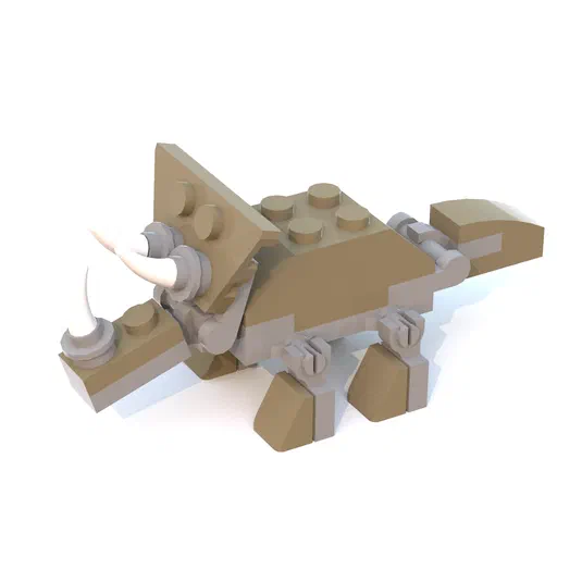 Un Triceratops en briques LEGO beige et gris avec trois cornes blanches, sur fond blanc.
