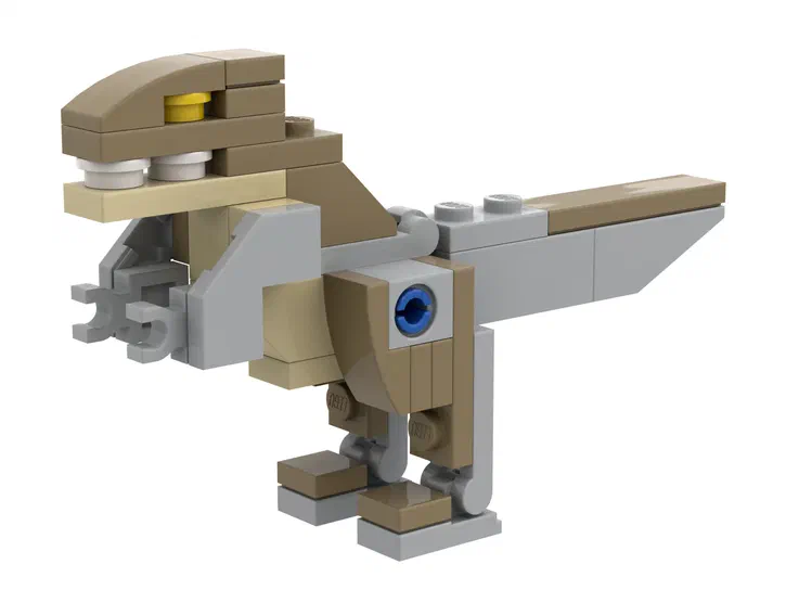 Un dinosaure Tyrannosaurus construit avec des briques LEGO de couleur beige et gris.