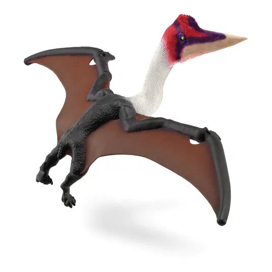 Figurine de Quetzalcoatlus avec des ailes déployées, un bec pointu et une tête rouge vif.