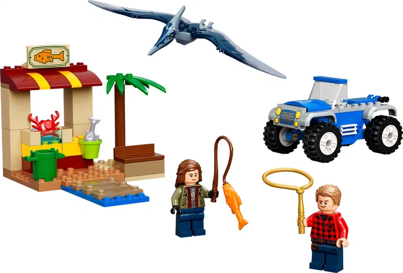 Ensemble de construction LEGO Jurassic World incluant un stand, une pterodactyle, un véhicule bleu et deux personnages minifigures.