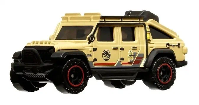 Voiture de collection Matchbox représentant un Jeep Gladiator beige avec des détails noirs et rouges.