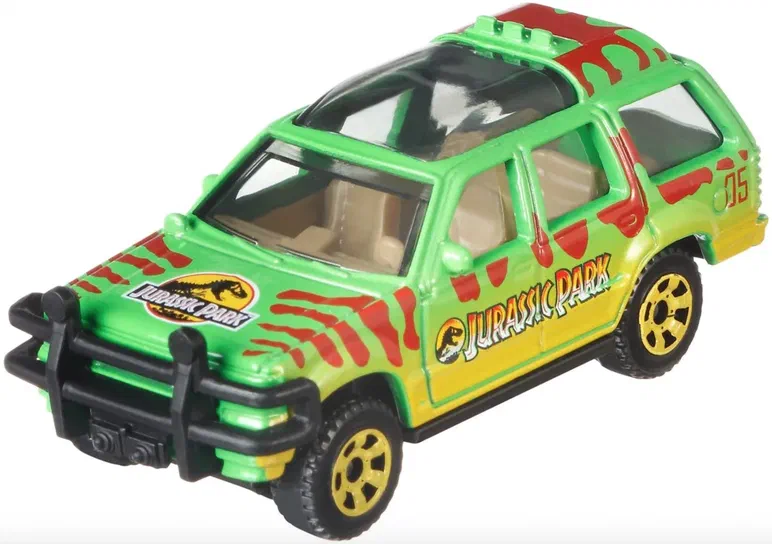 Ford Explorer vert et jaune de la franchise Jurassic Park avec des rayures rouges, un logo sur le capot et une barre noire avant.