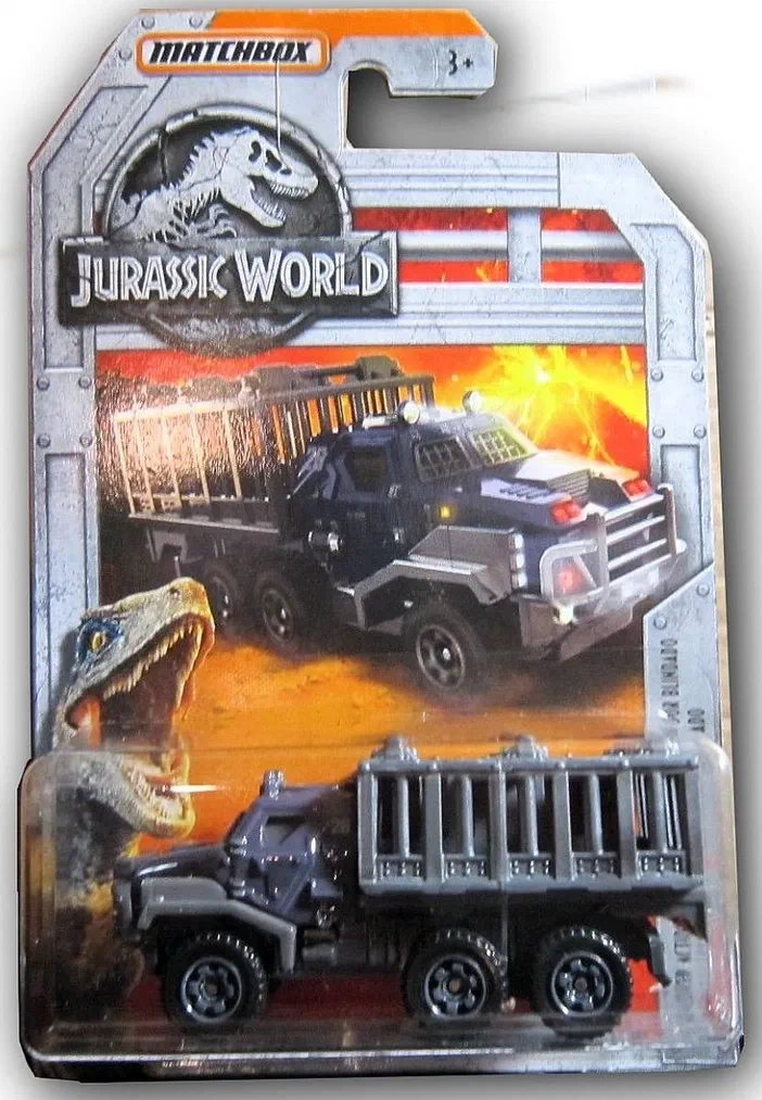 Packaging Matchbox Armored Action Transporter Jurassic World avec camion blindé gris et dinosaure en bas.