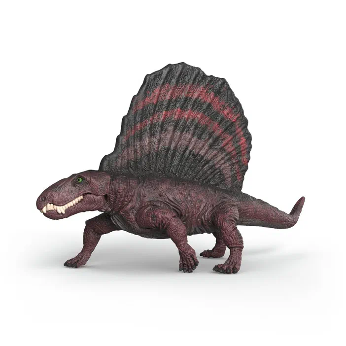 Figurine de dinosaure Dimetrodon avec une crête dorsale rouge et noire sur fond blanc.