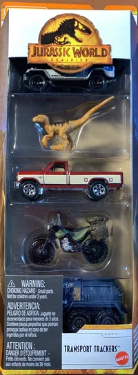 Boîte de jouets Matchbox Jurassic World Dominion Transport Trackers HBH82 contenant un Jeep Wrangler, une Ford F-150 '86, une moto Speed Striker et un camion blindé Armored Action Truck.