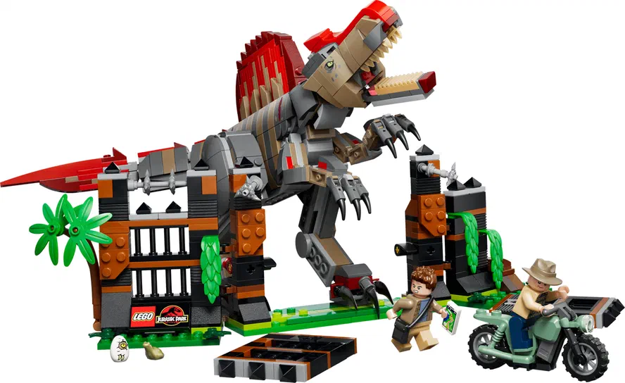 Ensemble de construction LEGO Jurassic World montrant un Spinosaurus échappé d'une cage avec des personnages et une moto.