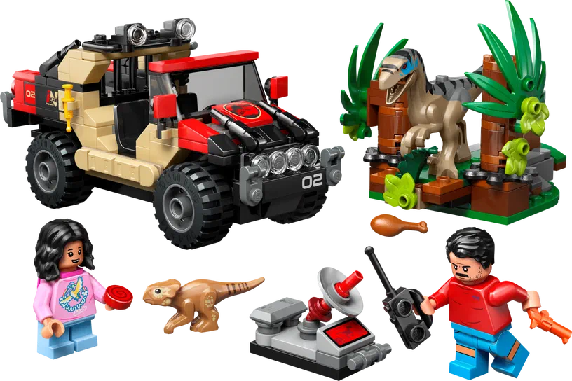 Ensemble de construction LEGO Jurassic World incluant un véhicule tout-terrain, une créature reptilienne dans sa tanière, deux personnages minifigures et divers accessoires.