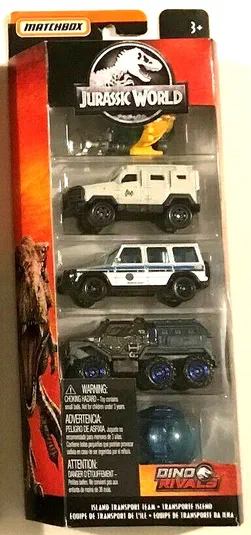 Packaging Matchbox Jurassic World contenant cinq véhicules : un dinosaure, une Textron Tiger blanche et noire, une Mercedes-Benz G-Class blanche avec des rayures bleues, un Armored Action Truck noir, une Gyrosphere bleue transparente et une Deep-Dive Submarine.