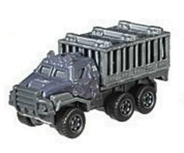 Puce Matchbox Armored Action Transporter gris foncé avec une cabine blindée et un plateau de transport à barreaux.