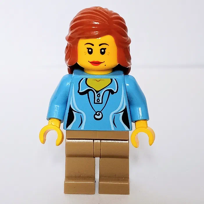 Minifigurine LEGO de la série Research Institute avec des cheveux d'orange foncé, un haut bleu moyen et des jambes marron foncé.