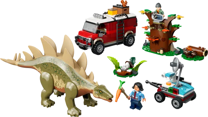 Ensemble de pièces LEGO Jurassic World incluant un stégosaure, une voiture rouge et des accessoires.