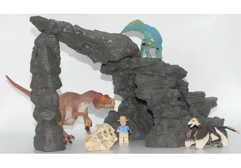 Couverture de Kit de dinosaures avec grotte