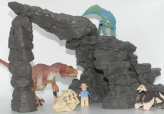Couverture de Kit de dinosaures avec grotte