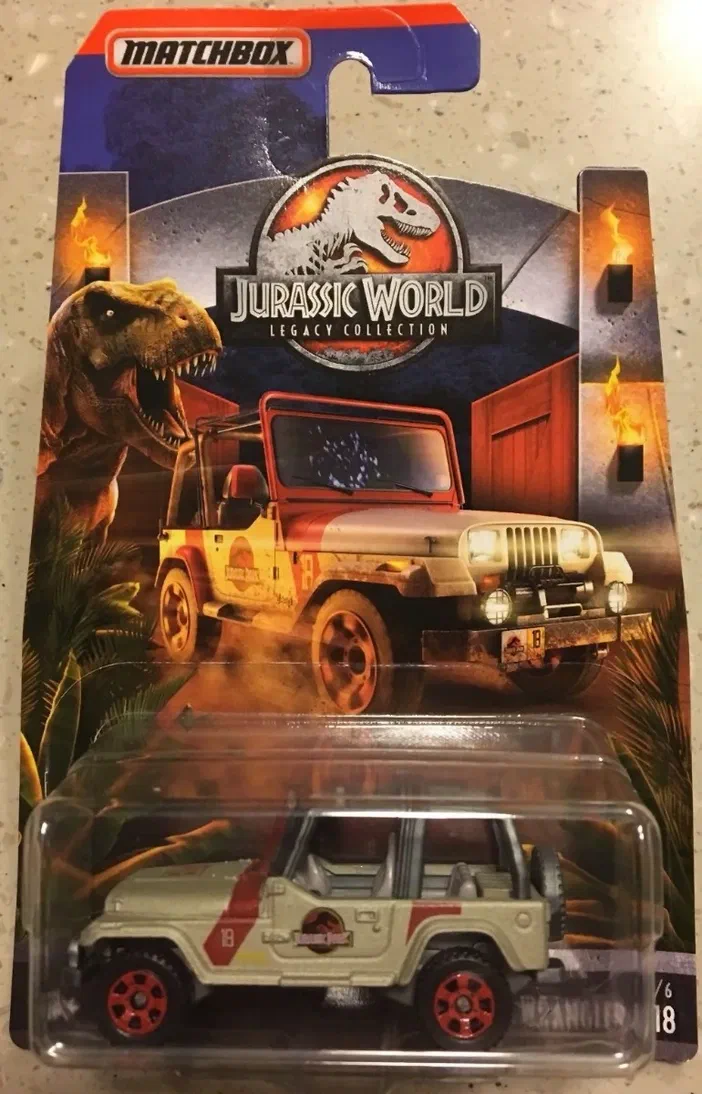 Packaging Matchbox Jeep Wrangler de la collection Jurassic World Legacy Collection avec un T-Rex en arrière-plan