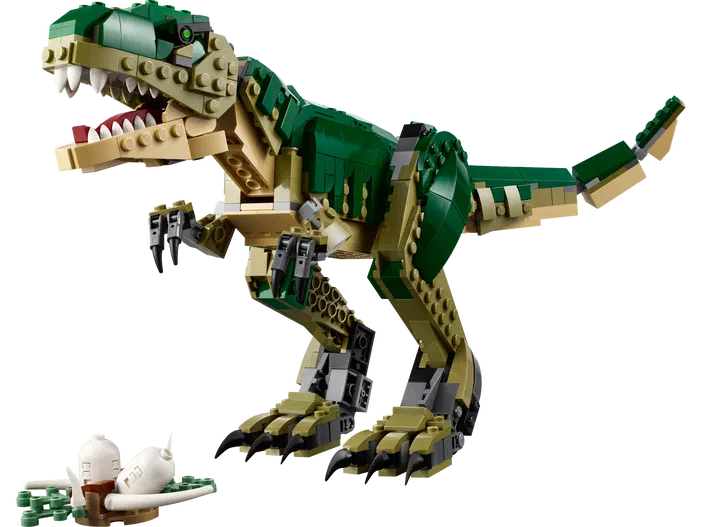 Un dinosaure T. rex en briques LEGO vertes et beige, avec une figurine de victime au sol.