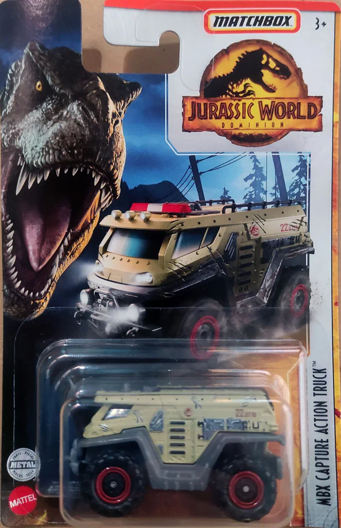 Packaging du camion d'action MBX Capture Action Truck de Jurassic World Dominion avec un T-Rex en arrière-plan