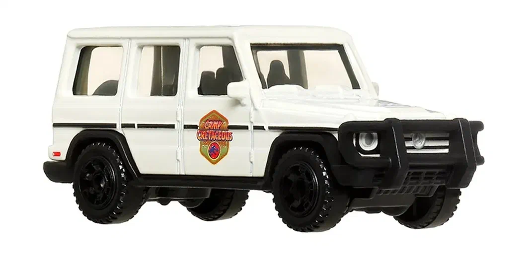 Puce Matchbox blanche de la Mercedes-Benz G-Class avec un logo Jurassic Park sur le côté.