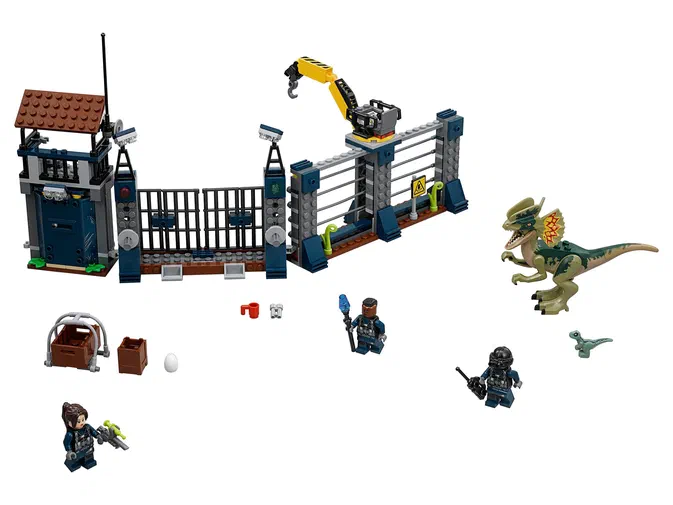 Ensemble de construction LEGO Jurassic World : Dilophosaurus Outpost Attack avec une tour de garde, des grilles, un dinosaure et trois personnages.